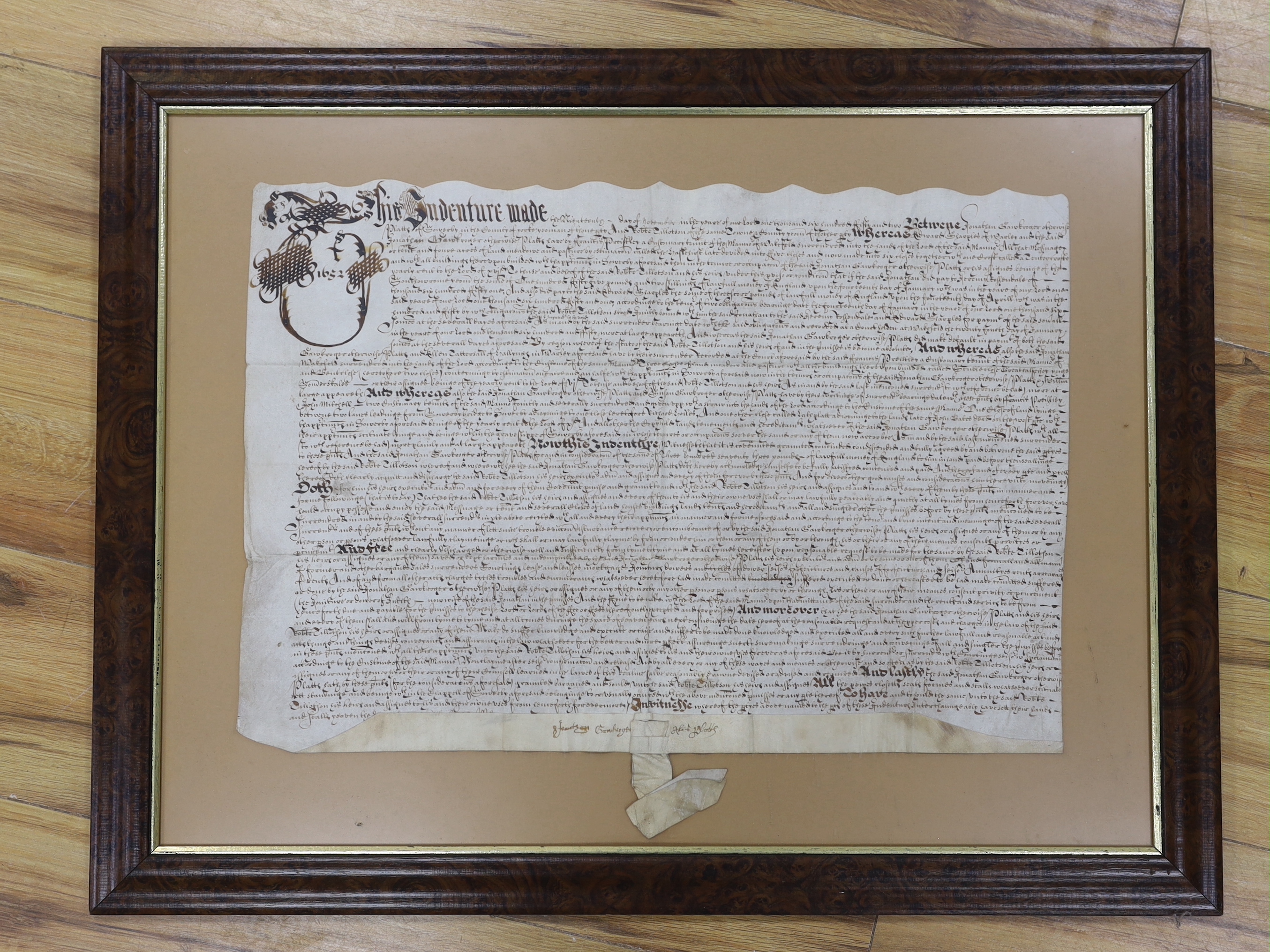 A Commonwealth period vellum indenture, dated 1652, framed, 37 x 54cm